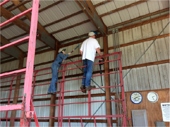 Power-Washing A Farm Building