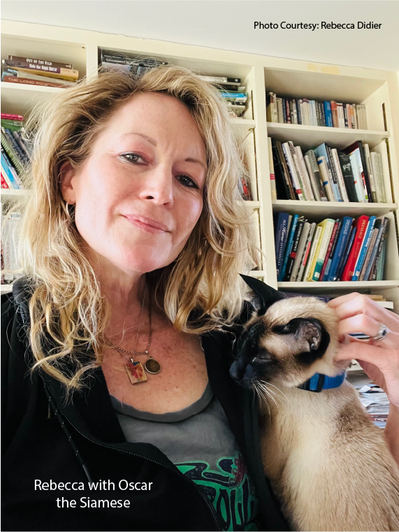 Transition Time at Trafalgar Square Books Rebecca In the TSB VT office with Oscar the Siamese